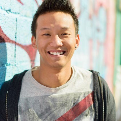 depositphotos_23464642-stock-photo-portrait-of-happy-asian-man-e1661984429651.jpg